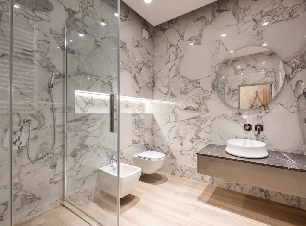 Bathroom refubrishment london transparent shower and wall tiles
